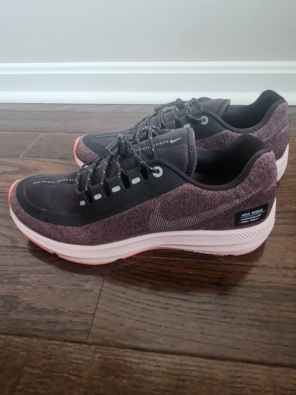 Nike Women's Shield Running Shoes in Plum Pink